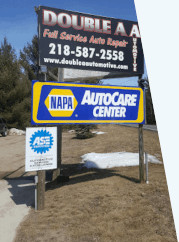 Double A Automotive LLC sign and NAPA sign