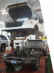 Vehicle on the lift being repaired at Double A Automotive LLC